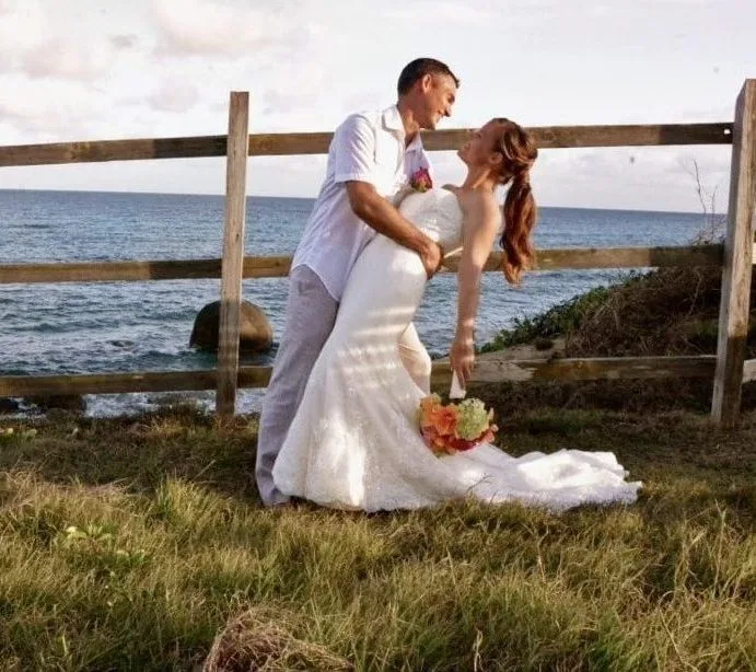 Couple celebrating an oceanfront wedding at Blue Horizon Boutique Resort